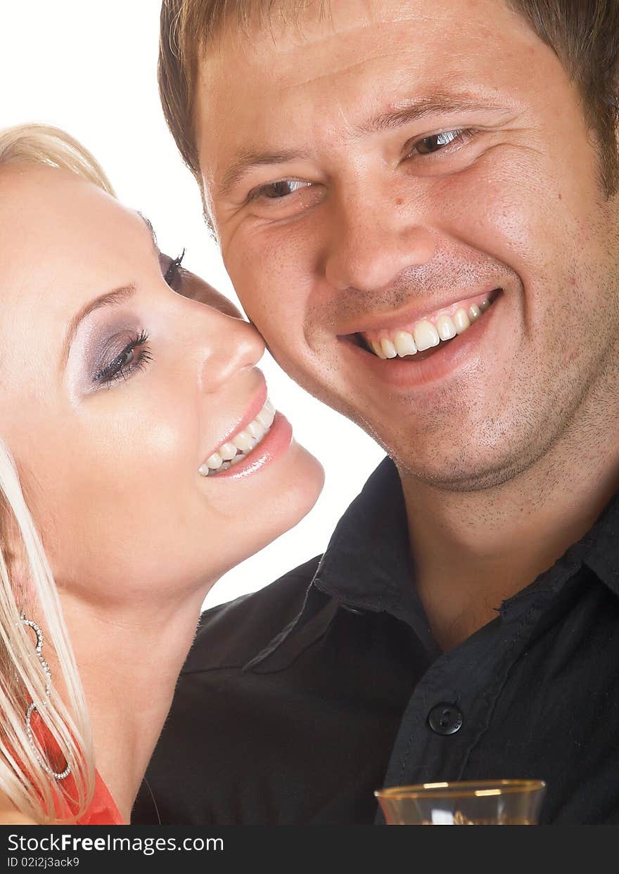 Happy young pair pose on a white background. Happy young pair pose on a white background