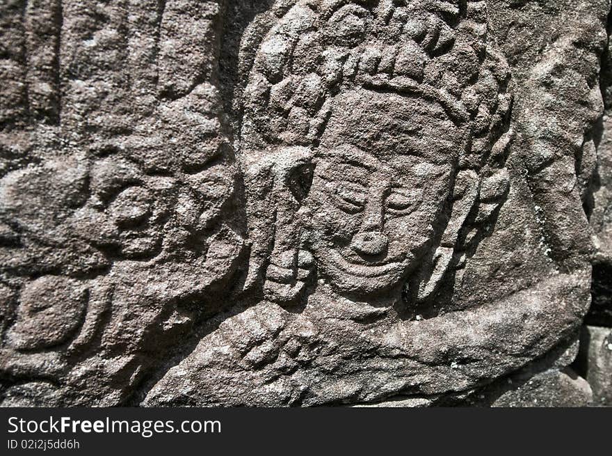 Details on the walls of Bayon within the Angkor Temples, Cambodia