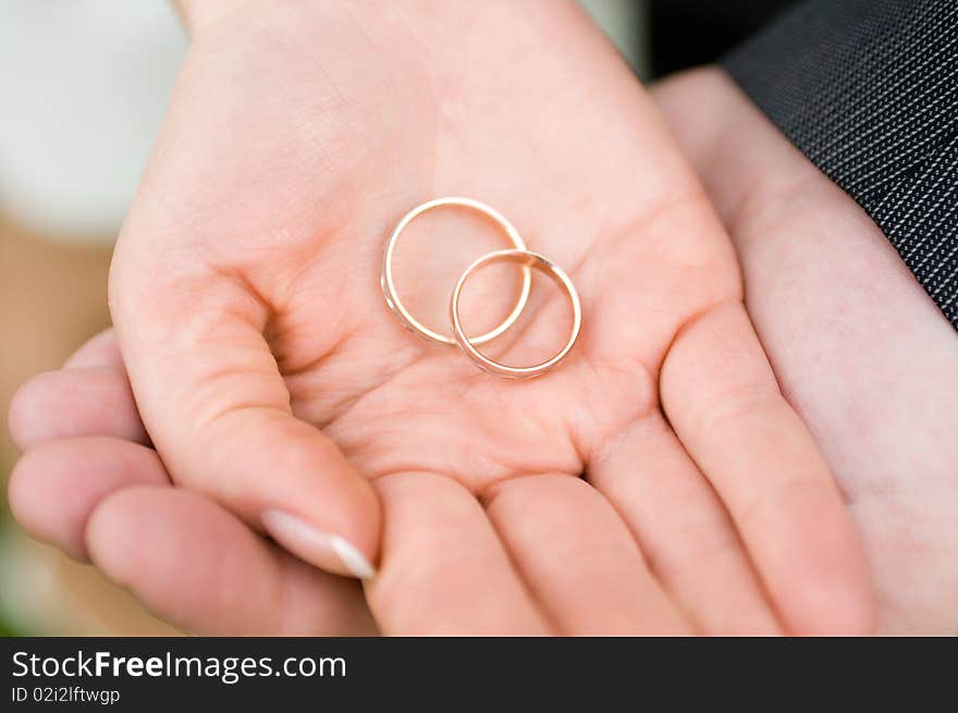 Hands holding rings