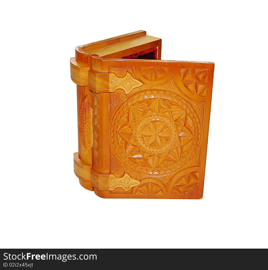 Open wooden casket in the form of books, decorated with carving