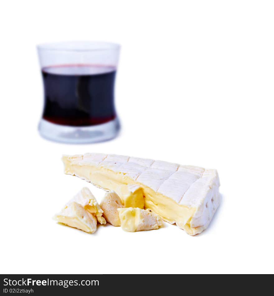 Brie cheese and glass of red wine