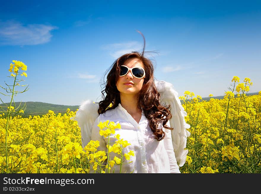 Happy girl with angel wings