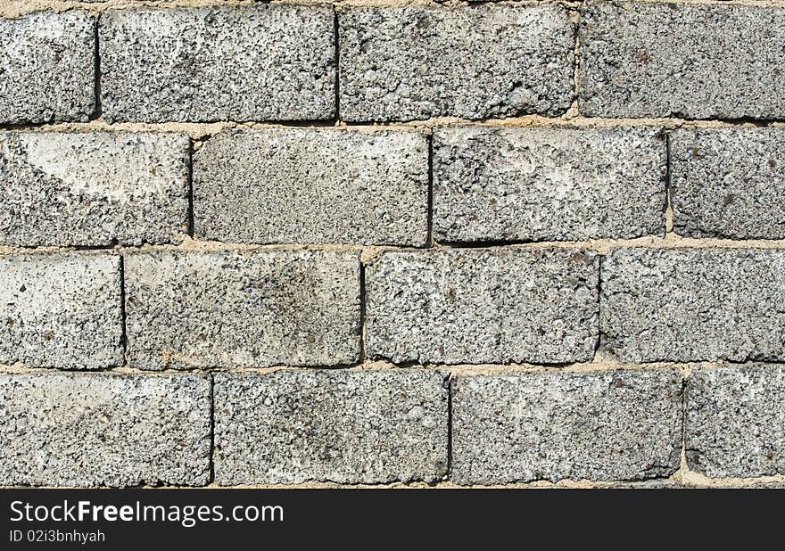 Pattern of gray brick wall, unfinished house wall. Pattern of gray brick wall, unfinished house wall.