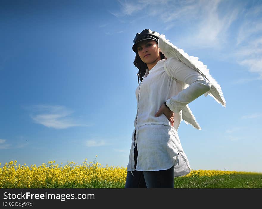 Happy girl with angel wings