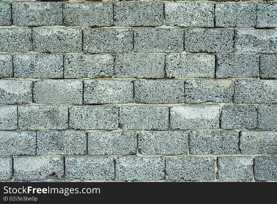 Pattern of gray brick wall, unfinished house wall. Pattern of gray brick wall, unfinished house wall.