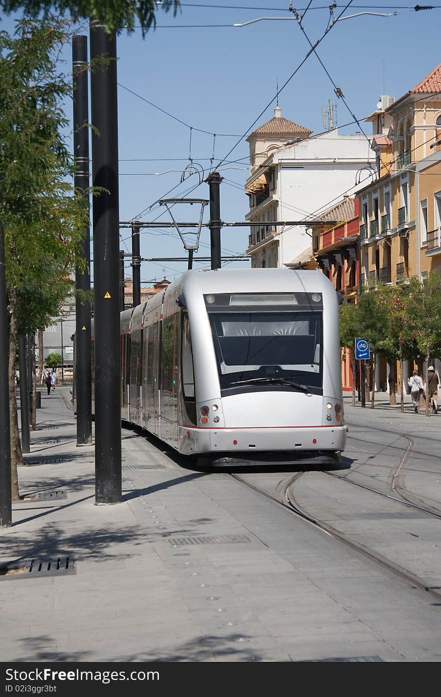 A moving tram in the city. A moving tram in the city