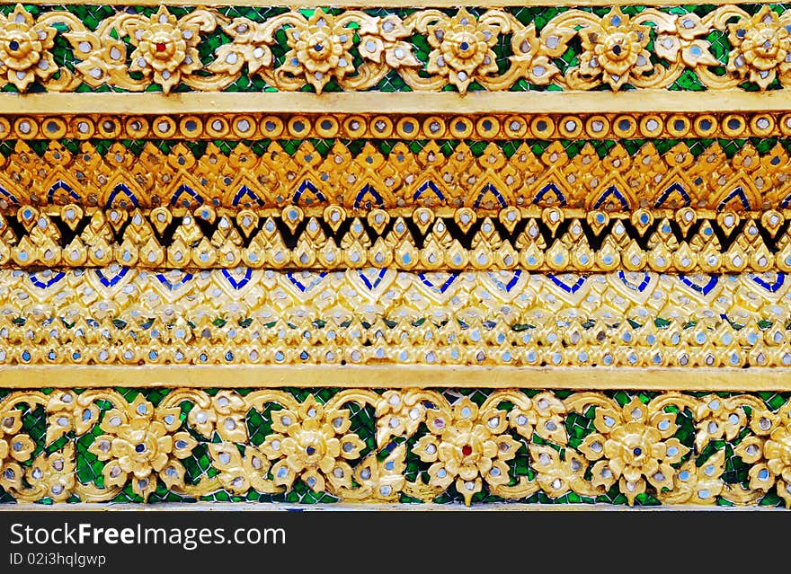 Thai archetectural decoration for Buddhist temple. Close-up photo. Thai archetectural decoration for Buddhist temple. Close-up photo