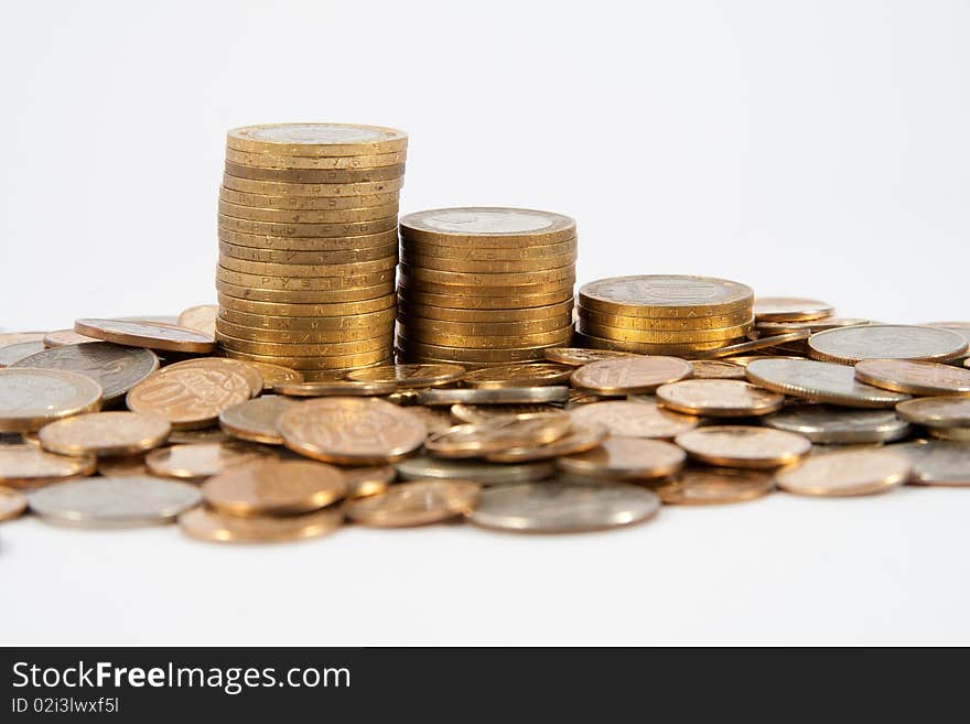 Coins of different countries on a white background