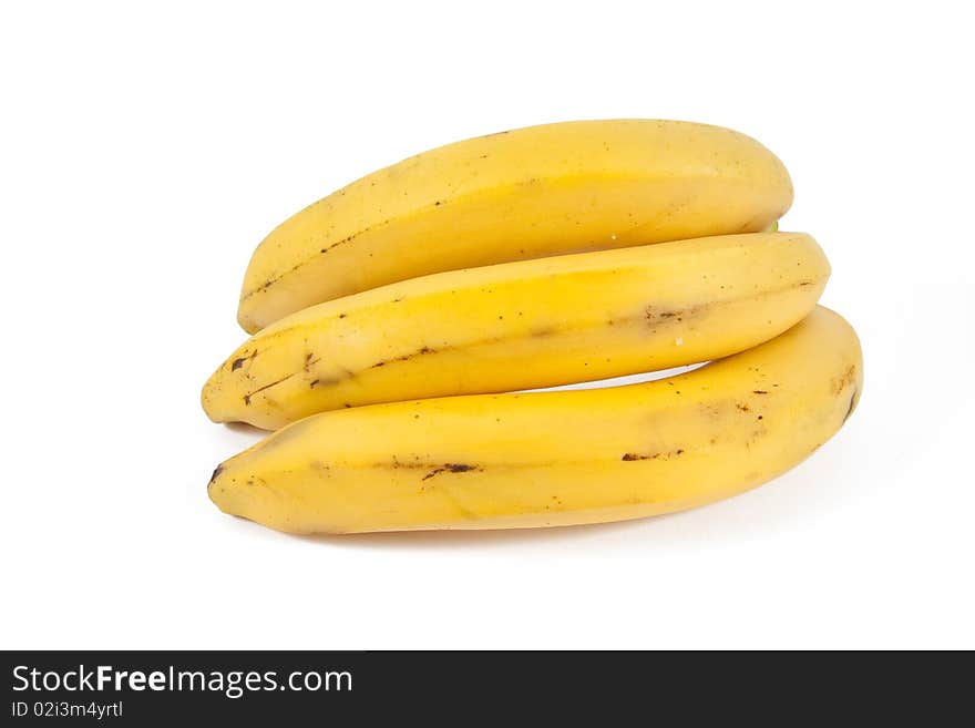 Three mature bananas on white background