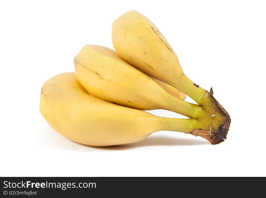 Three mature bananas on white background