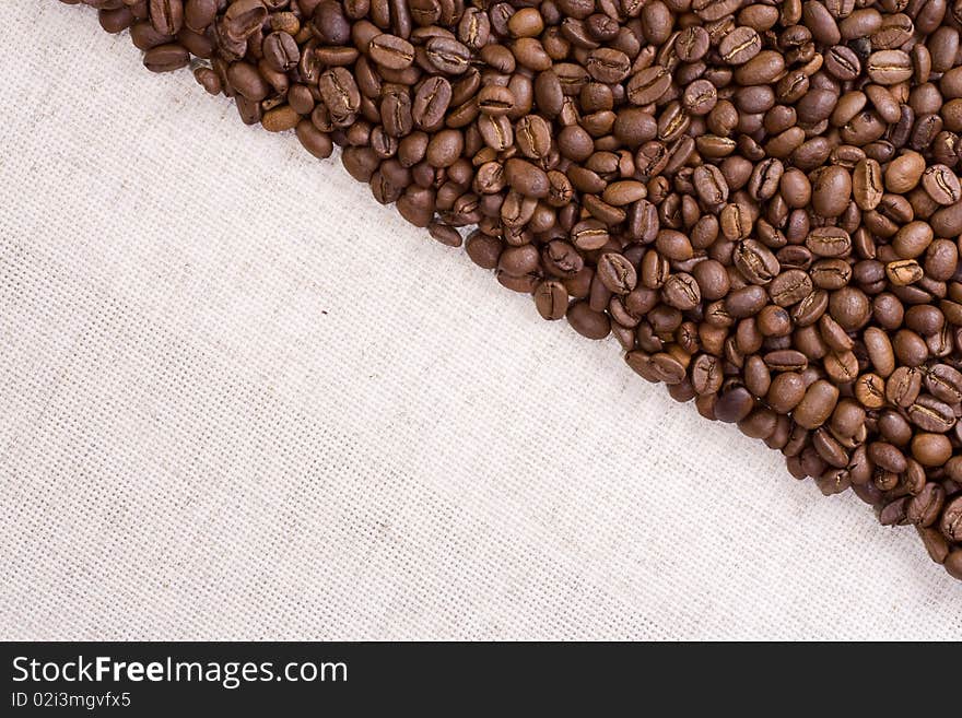 Coffee beans as triangle with textile