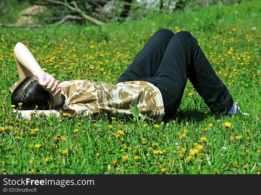 Girl dreaming on the grass