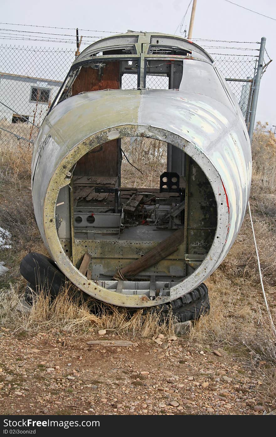 Nose of derelict airplane on ground