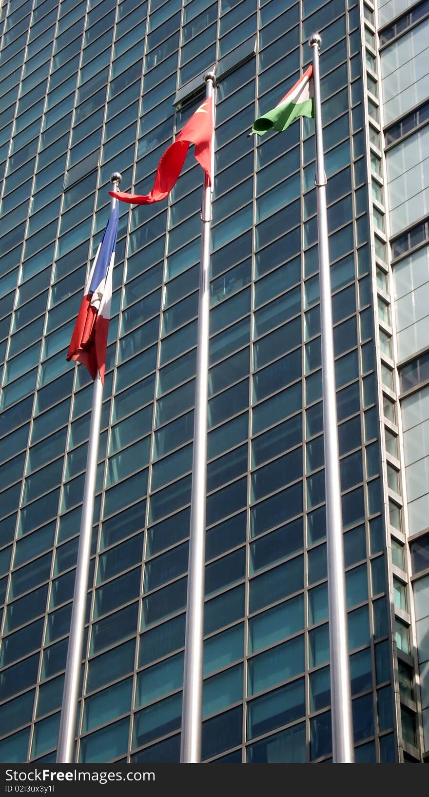 Modern office building (toned in Green) and flags. Modern office building (toned in Green) and flags