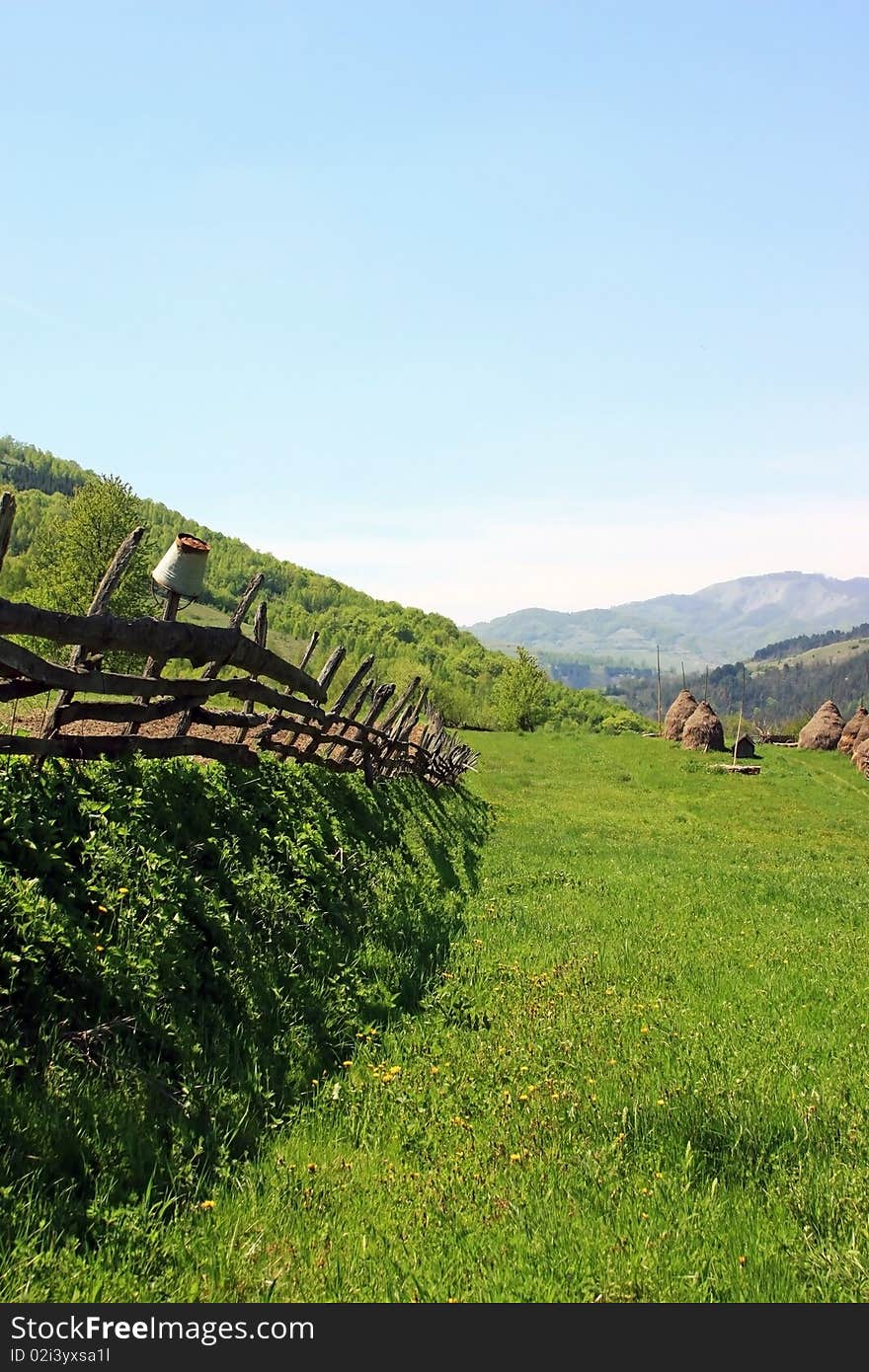 Green landscape during the spring with mountains in the background. Green landscape during the spring with mountains in the background