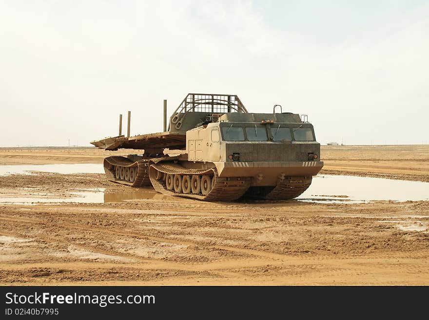 A powerful army truck all-terrain vehicle. Close-up. Day. A powerful army truck all-terrain vehicle. Close-up. Day.