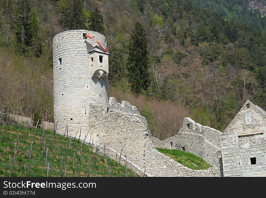 Very old fortress and church located on the alpes. Very old fortress and church located on the alpes