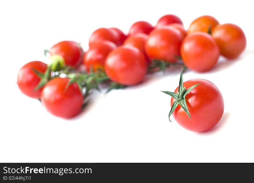 Cherry tomatoes isolated on white background