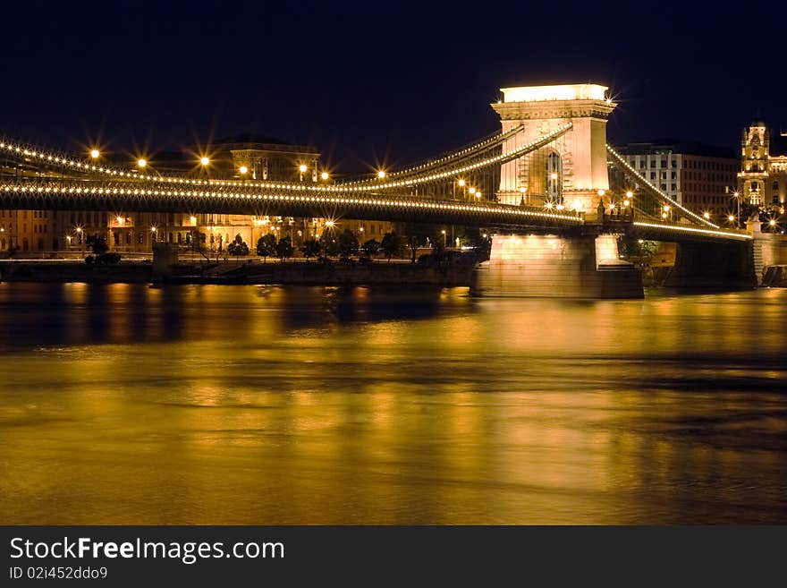 Budapest, with beautiful night lighting and bridges.