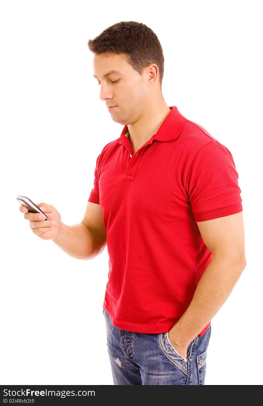 Young casual man using cellphone, isolated on white