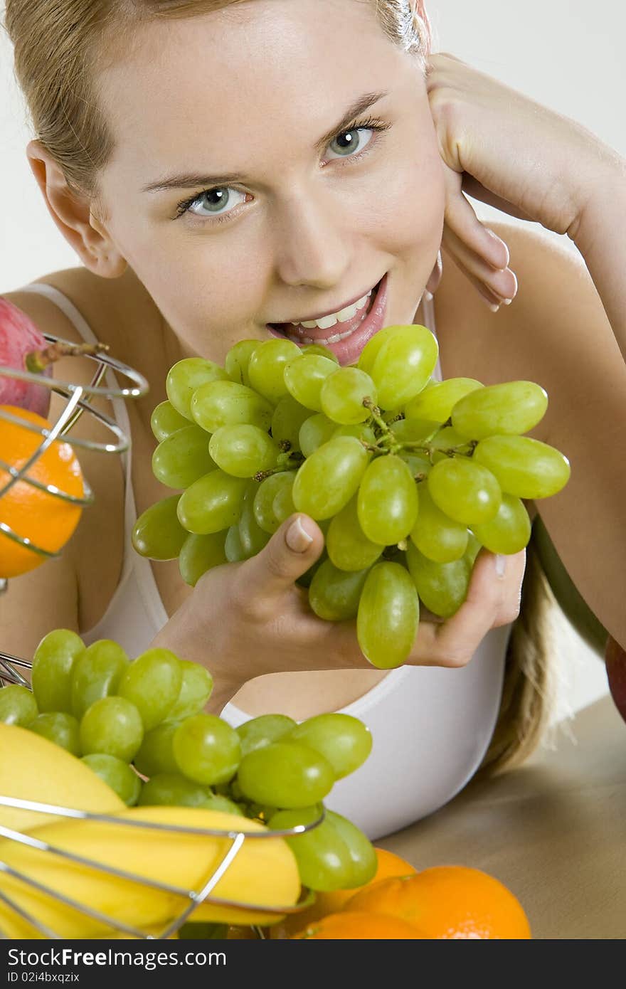 Woman during breakfast with fruit. Woman during breakfast with fruit