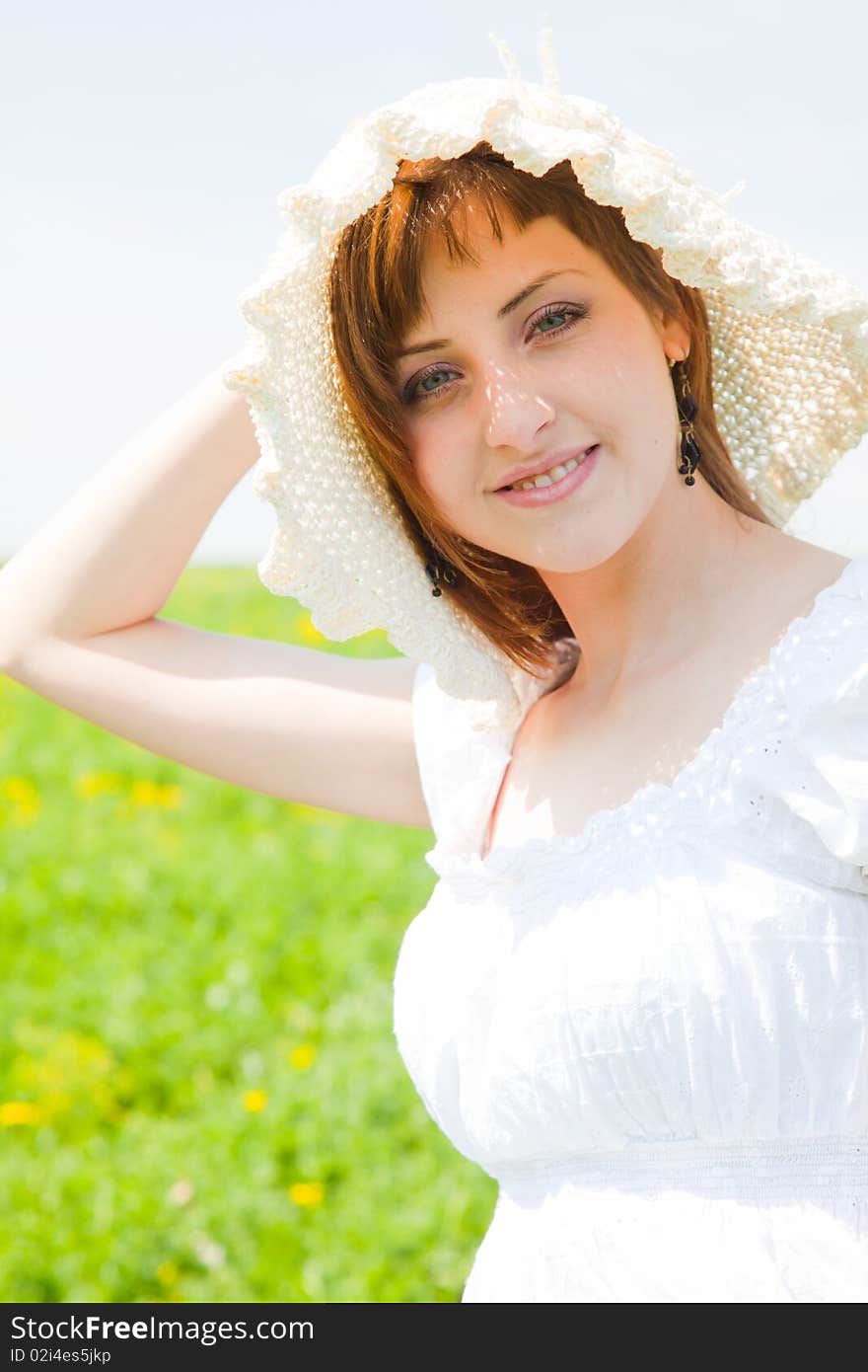 Beautiful young woman enjoying a sunny day of spring in the nature. Beautiful young woman enjoying a sunny day of spring in the nature