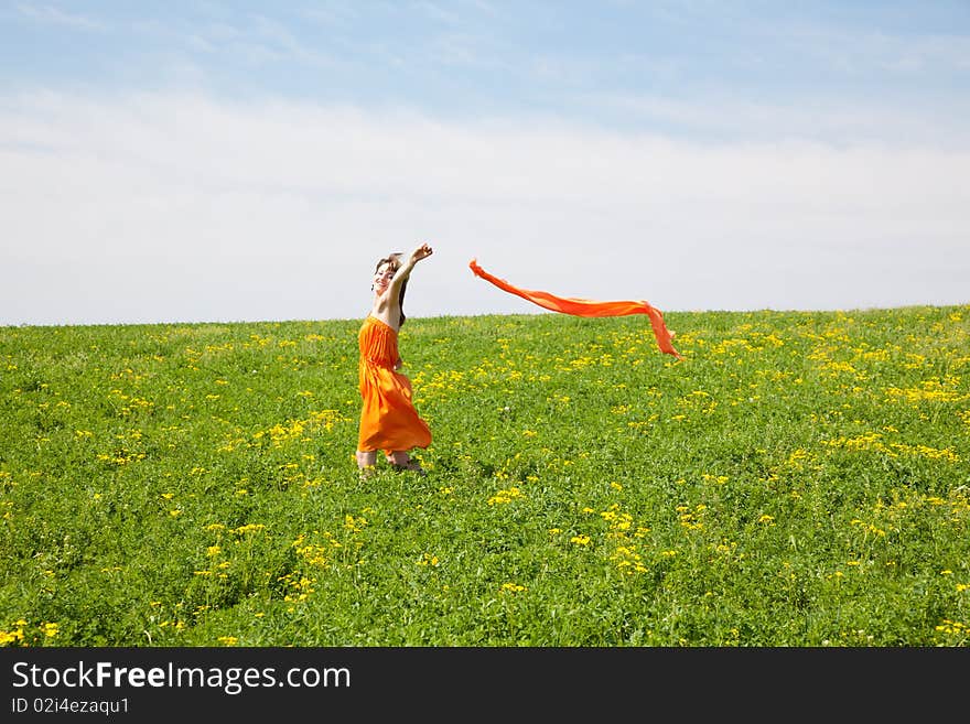 Beautiful young woman enjoying a sunny day of spring in the nature. Beautiful young woman enjoying a sunny day of spring in the nature