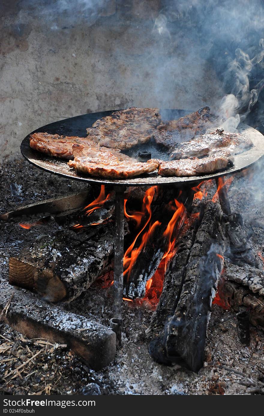 Meat on the barbecue with grillmarks