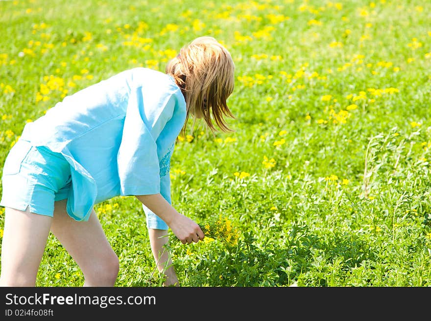 Beautiful young woman enjoying a sunny day of spring in the nature. Beautiful young woman enjoying a sunny day of spring in the nature