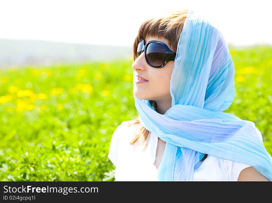 Beautiful young woman enjoying a sunny day of spring in the nature. Beautiful young woman enjoying a sunny day of spring in the nature