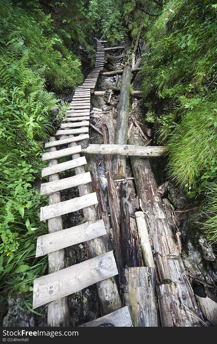 Mountain route over small stream