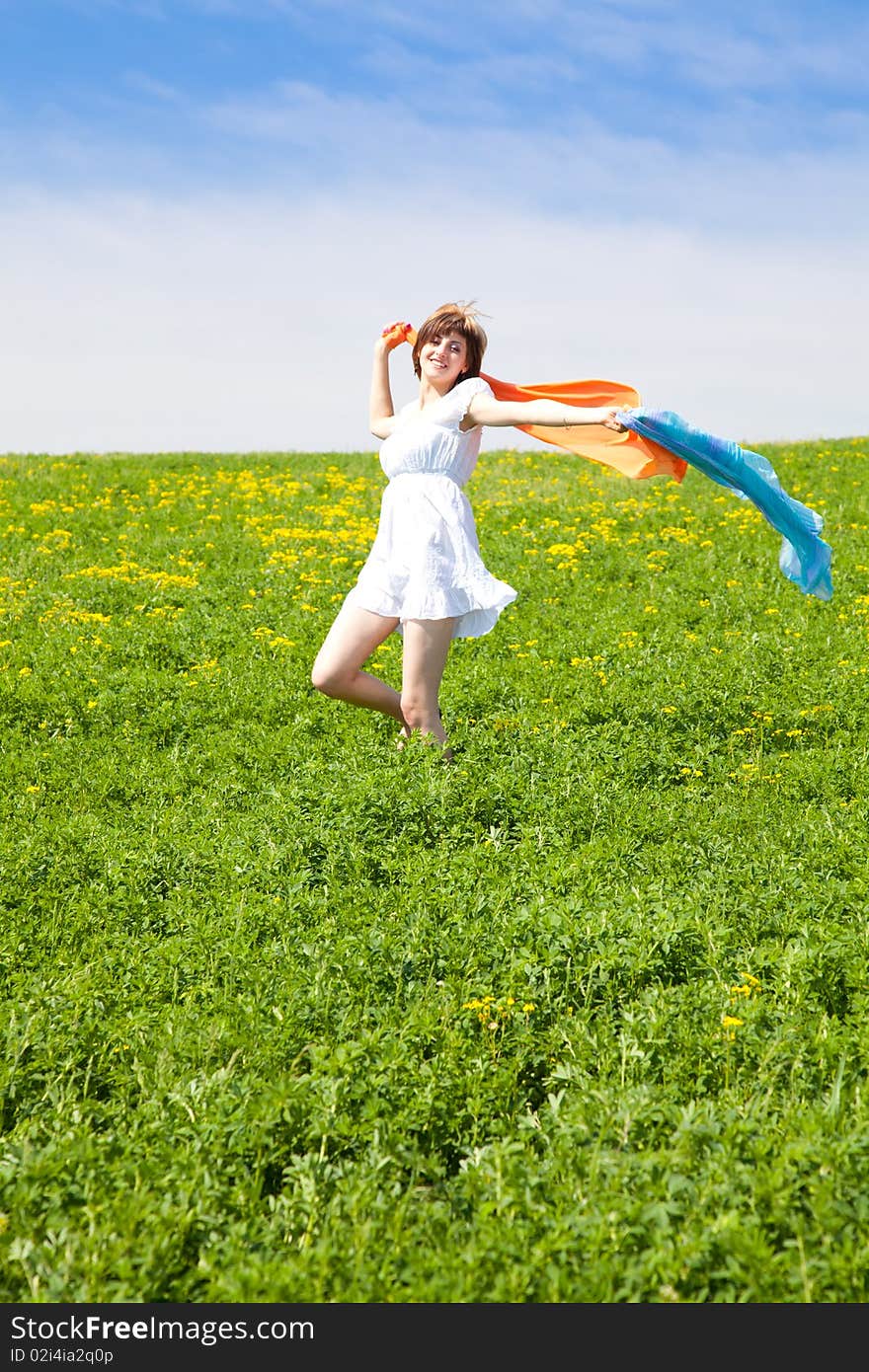 Young woman enjoying the nature in a warm spring day