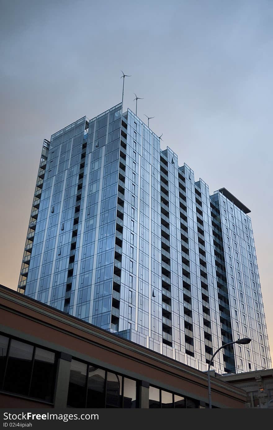 Building with wind turbines on roof, Twelve West Building, Portland, Oregon. Building with wind turbines on roof, Twelve West Building, Portland, Oregon