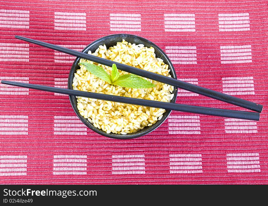 Curry rice bowl with chopsticks