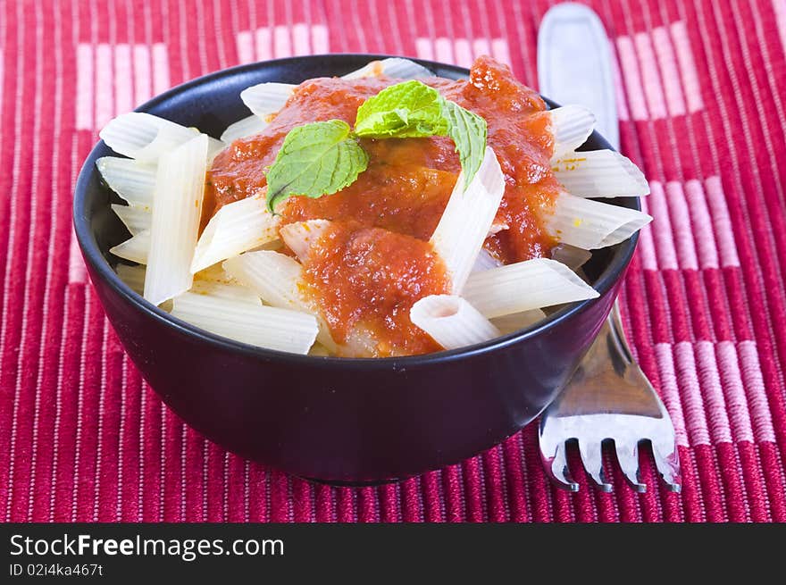 Lunchtime-rice pasta with tomato sauce. Lunchtime-rice pasta with tomato sauce