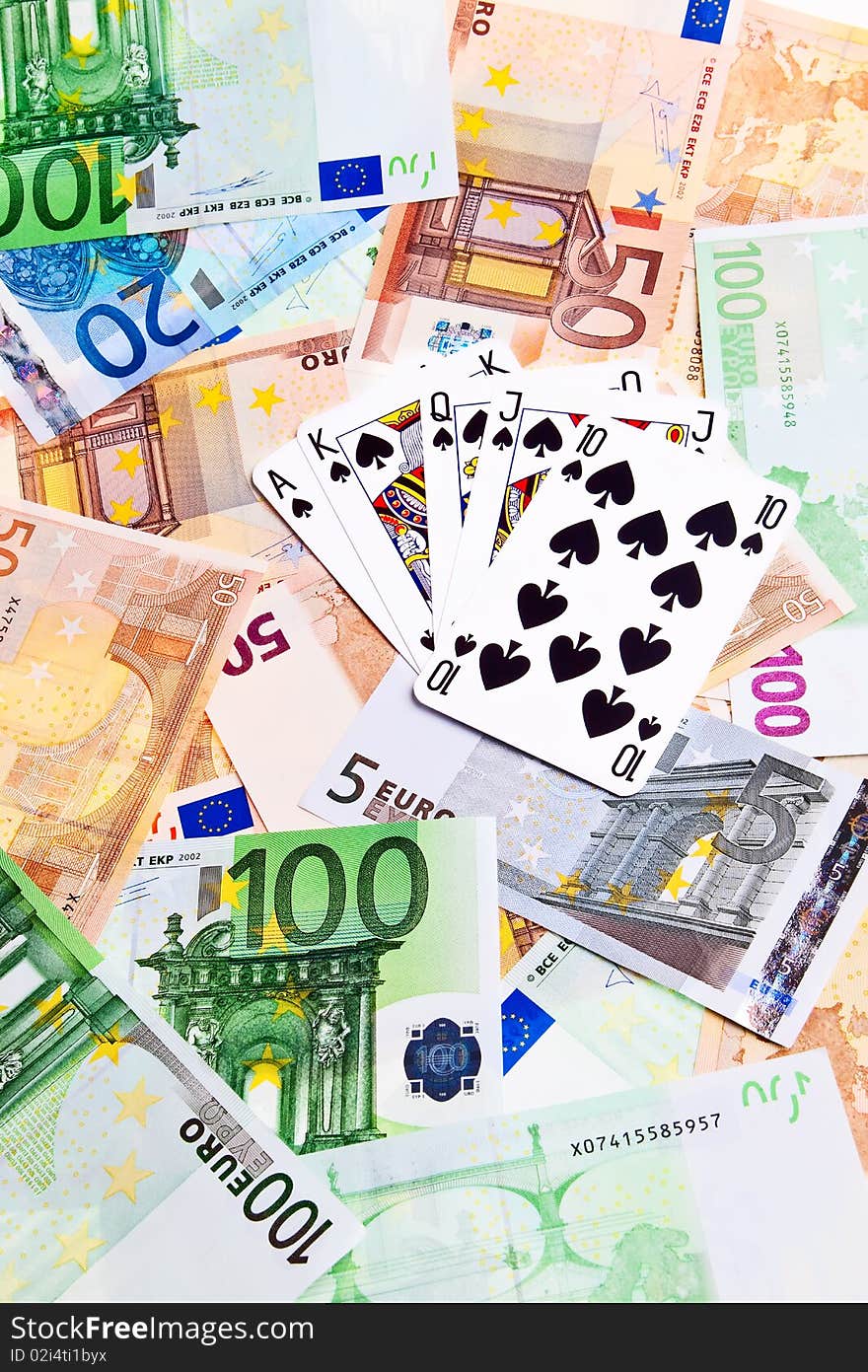 Spades cards and Euro banknotes.