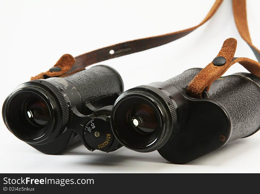 Old russian binoculars isolated on white background. Old russian binoculars isolated on white background