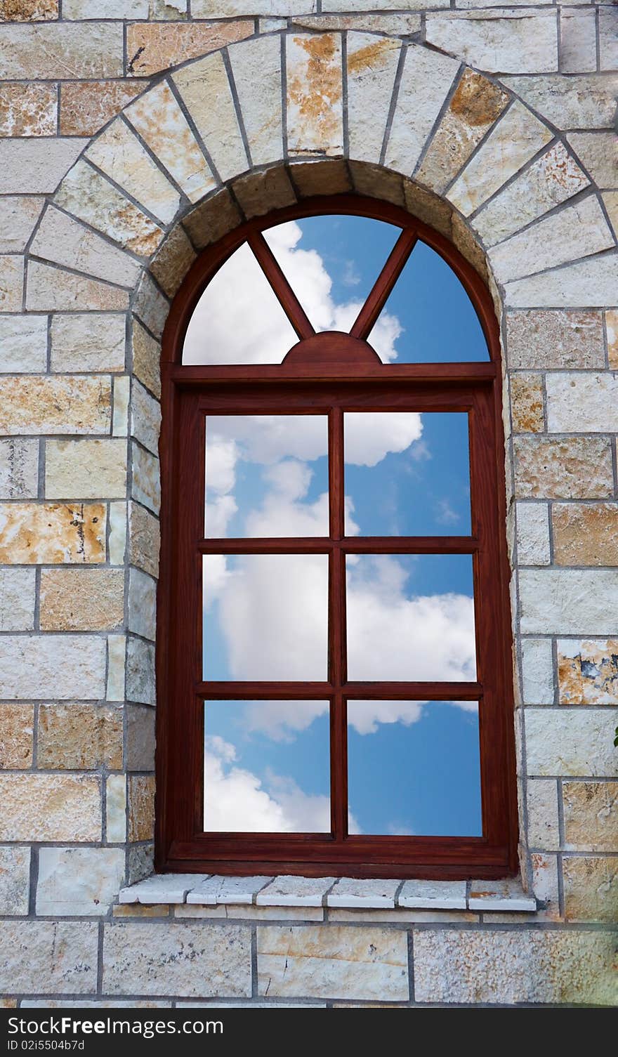 Window with Sky view in , build in wall of old bricks