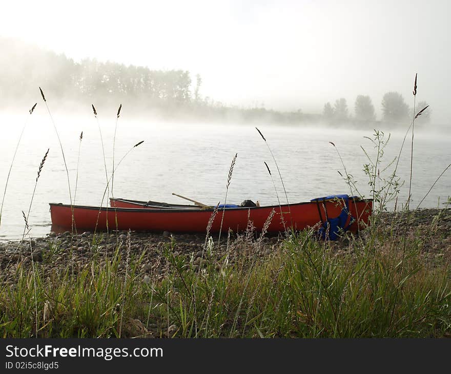 Canada canoe river bank fog and mist. Canada canoe river bank fog and mist