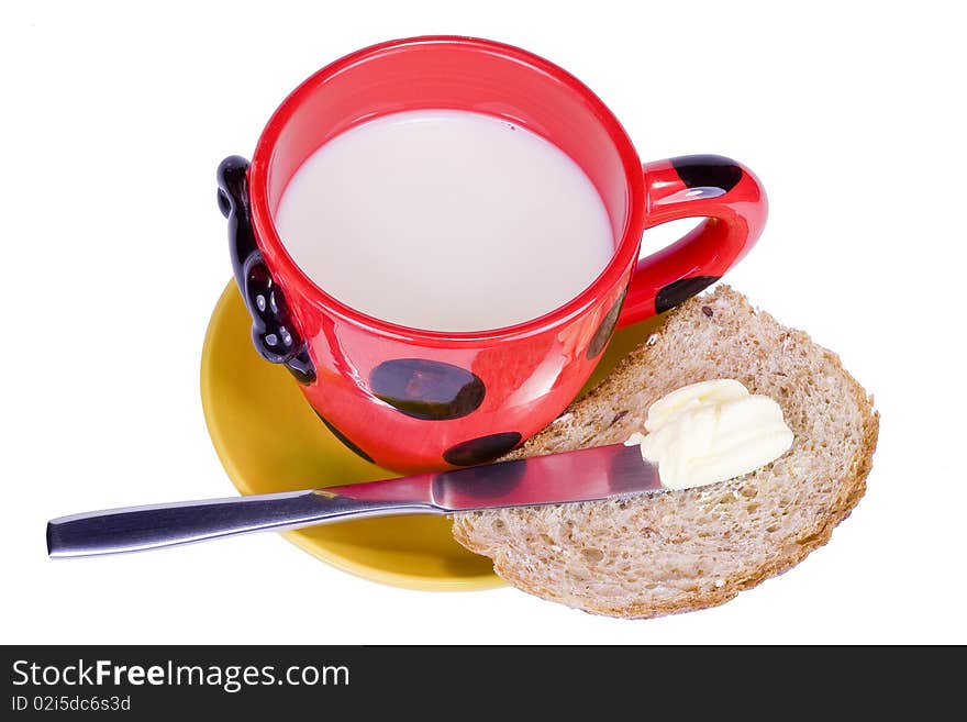 A cup of milk and some bread for morning breakfast