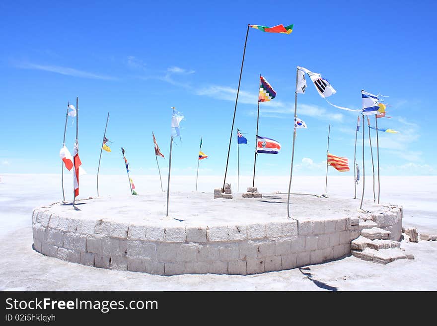 Flags of Different Nations on White Plain. Taken on the Salar de Uyuni (or Uyuni Salt Flats) in Bolivia.