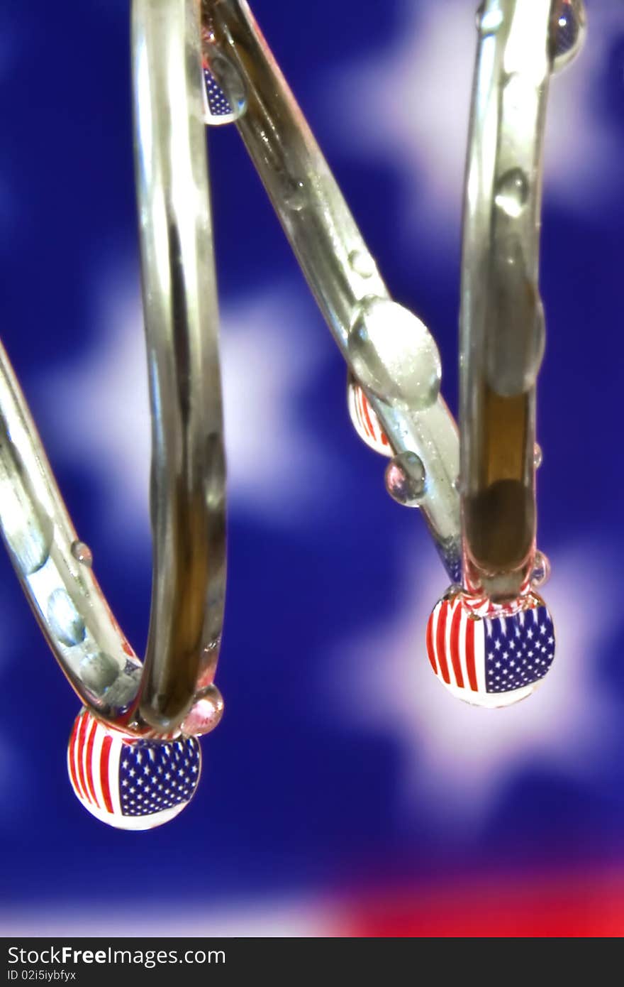 View of the American Flag inside water droplets.