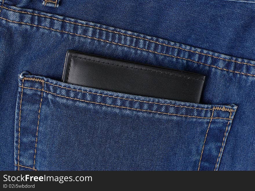 Wallet in jeans pocket