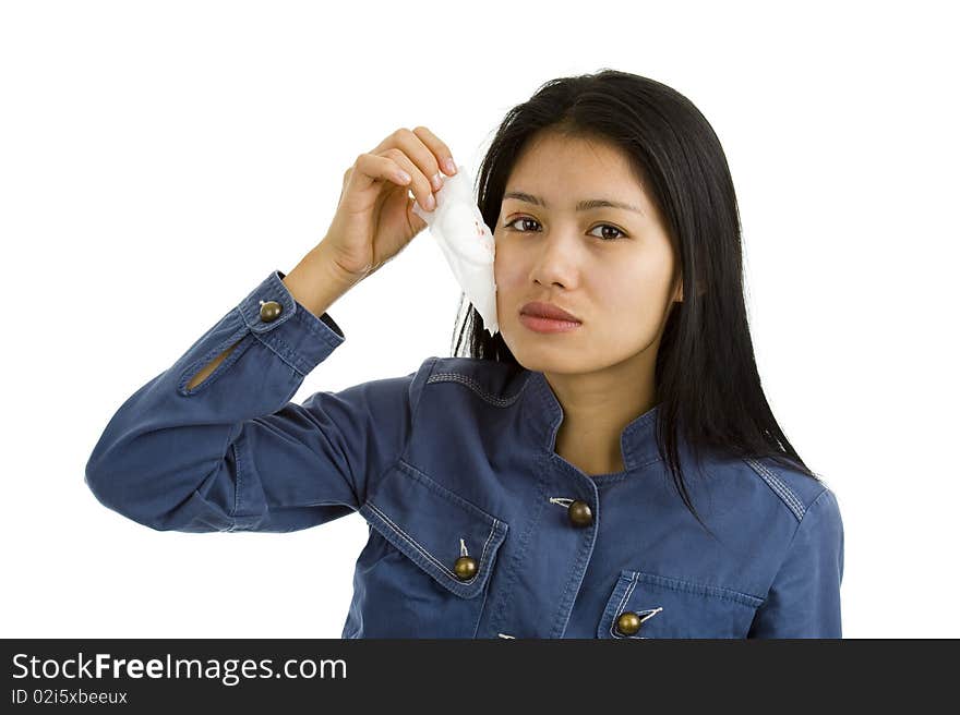 Young Woman Removing Bandage From Her Eye