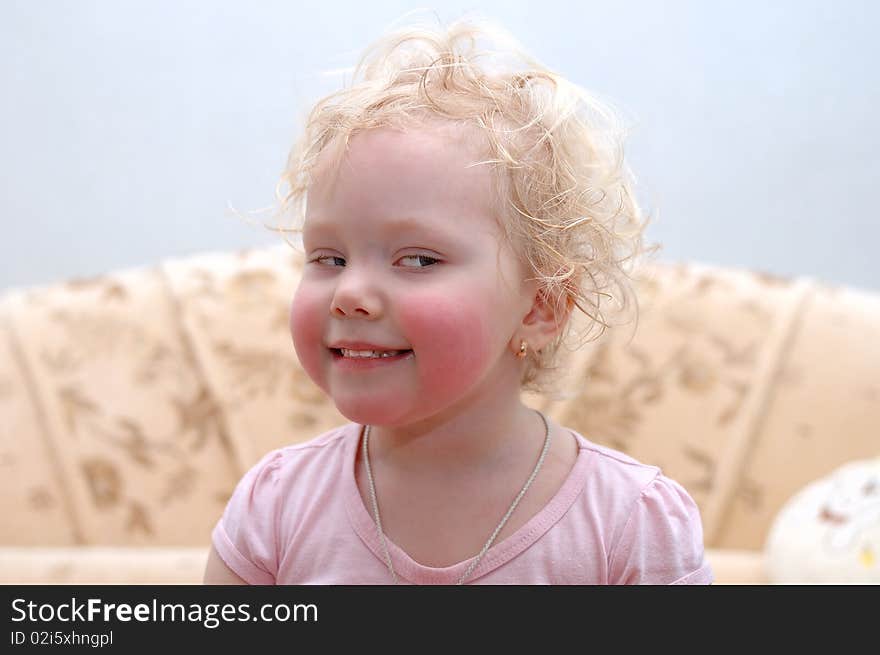 Pretty curly blond hair girl make faces (grimace). Pretty curly blond hair girl make faces (grimace).