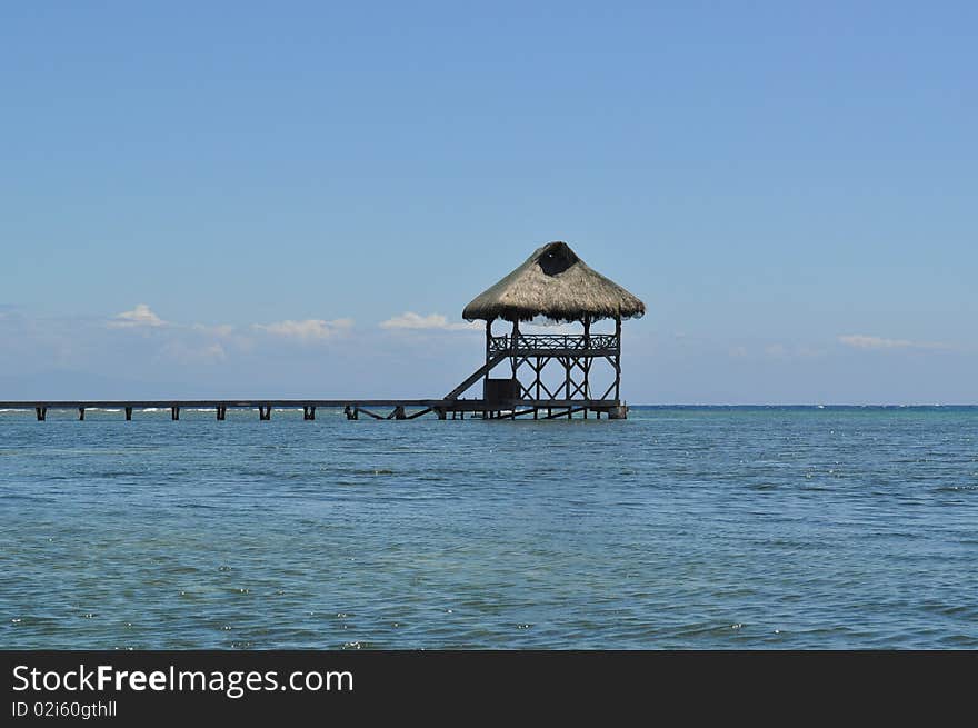 A serene view of a lookout point at the end of a pier. Taken in Roatan, Honduras. A serene view of a lookout point at the end of a pier. Taken in Roatan, Honduras.