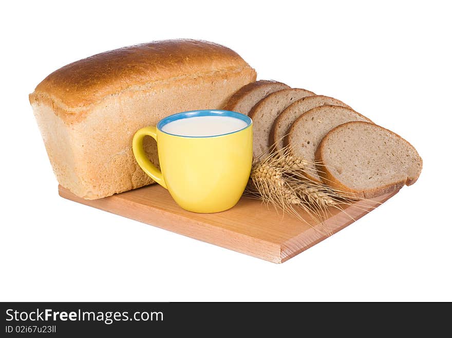 Bread and cup with milk