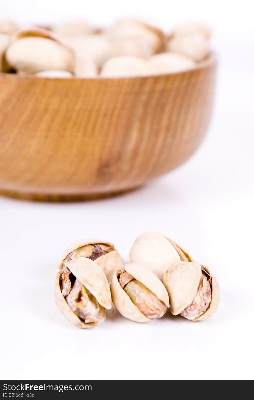 Pistacia nuts on white background