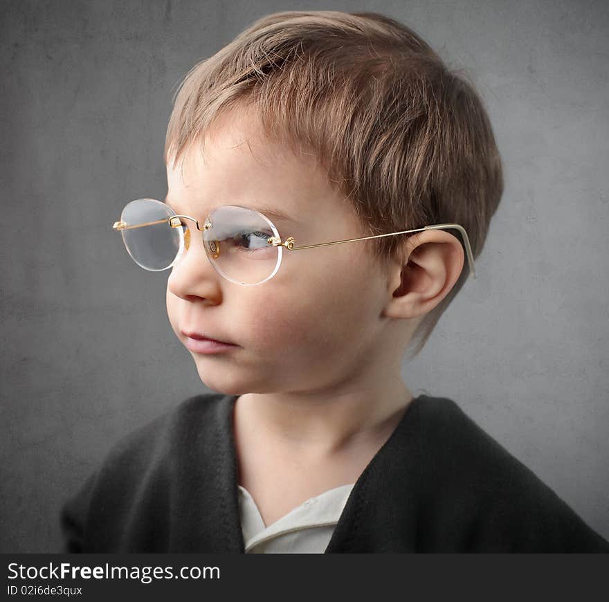 Profile of a child wearing glasses