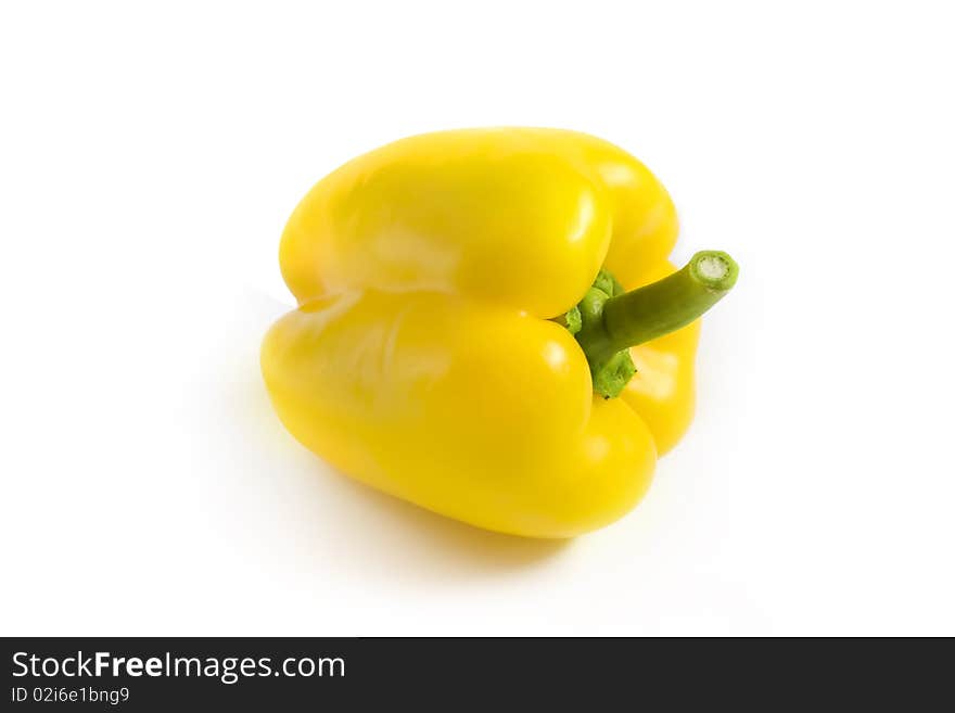 Yellow pepper on a white background. A photo close up.